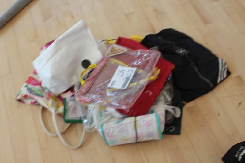 lot 97 image: Pile Lot of Bags