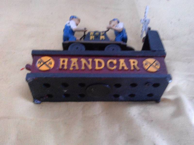 VINTAGE HAND CAR CAST IRON BANK