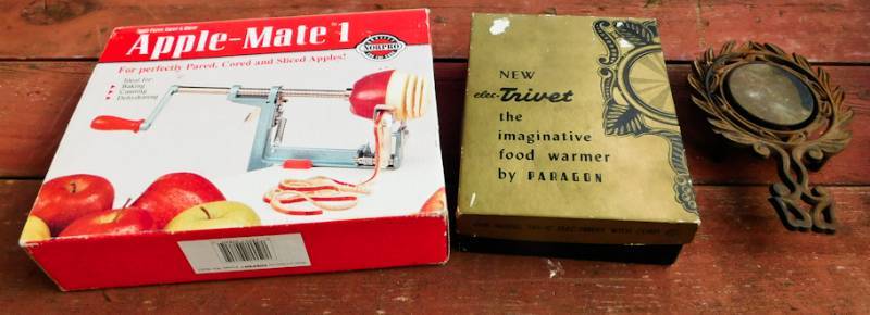 lot 45 image: vintage apple peeler and two electric trivets