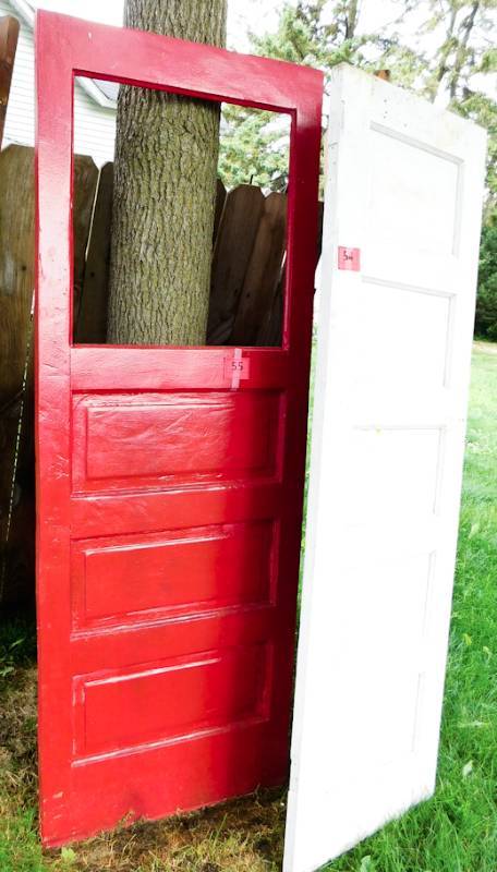 lot 55 image: vintage red door three panels one pane no glass