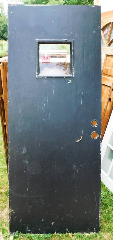 lot 59 image: black wooden door one window pane