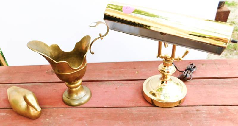 lot 73 image: three brass items duck, lamp and pitcher