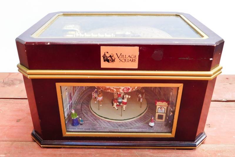 lot 79 image: Village Square Winter Merry Go Round with music player