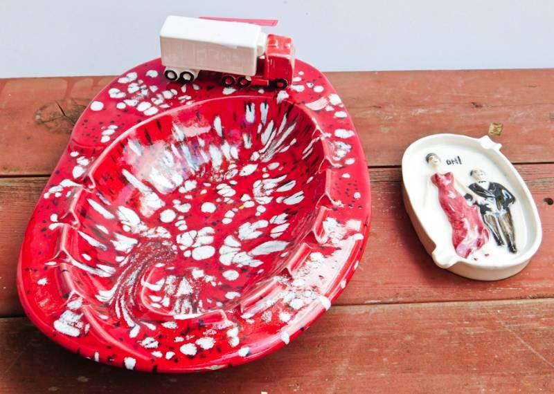 lot 86 image: really cool red and white ashtray and a cool naughty ashtray