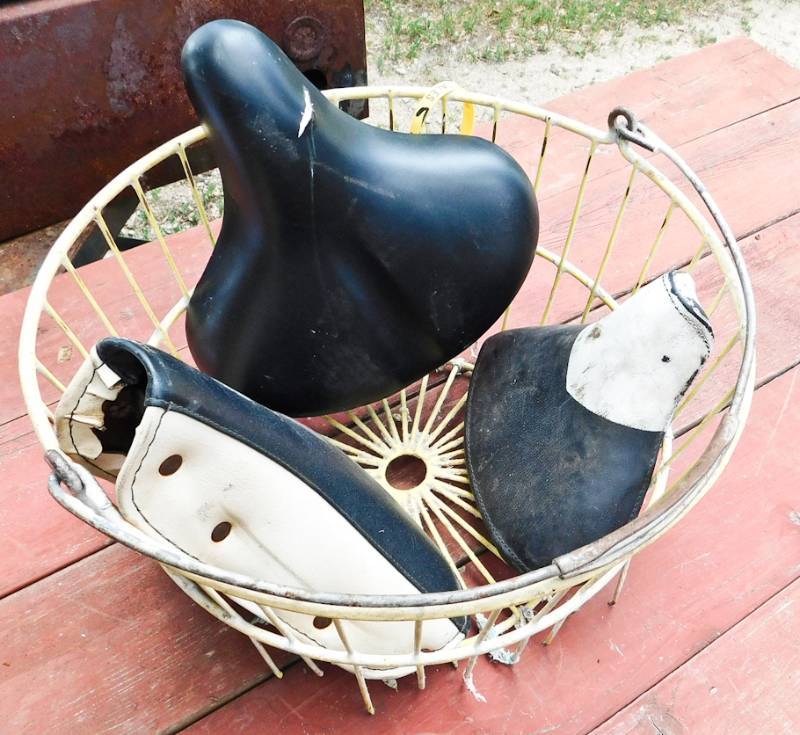 lot 114 image: egg basket and 3 bicycle seats