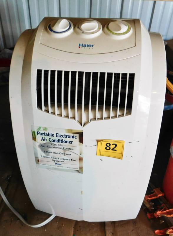 lot 82 image: Haier Portable air conditioner as seen works rarely used