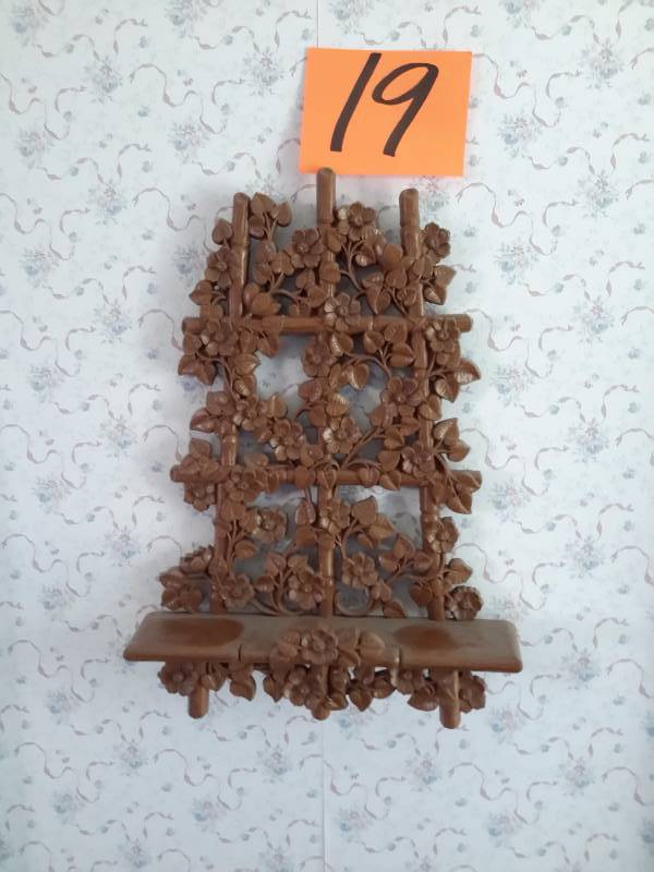 Nice wood carved display shelf.