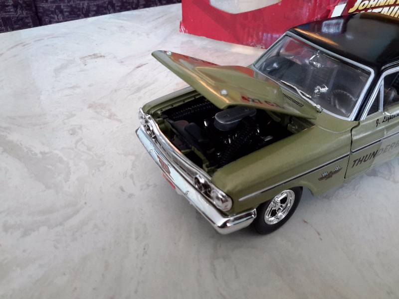 JOHNNY LIGHTNING, 1964 Ford Thunderbolt Die Cast. .Original Box and looks like never played with