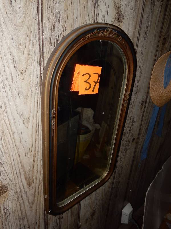 Round top mirror with Wood and plaster case frame.. Divided glass mirror as shown.. Looks to be in pretty good shape..