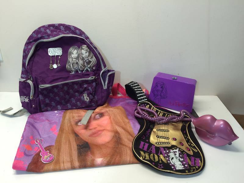 lot 28 image: Hannah Montana and Bratz