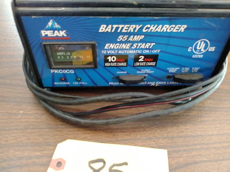 lot 85 image: Peak 12 Volt battery Charger, Works...