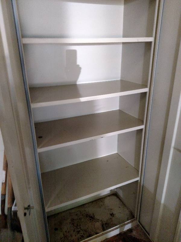 lot 142 image: 2 Door Metal Cabinet...