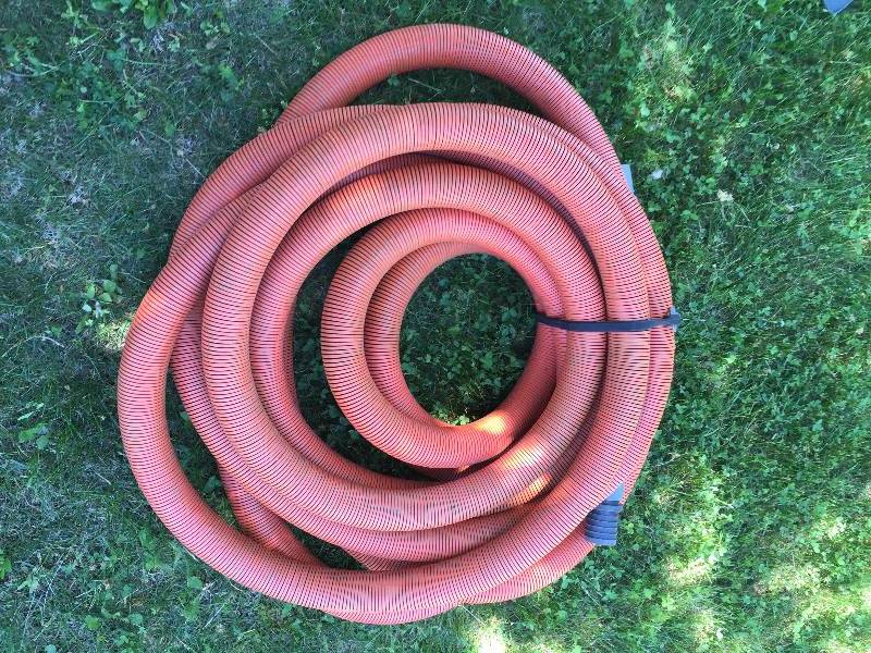 lot 32 image: 50 (Foot) 2  Thick Commercial Professional-Grade Carpet Cleaning Vacuum Hose With Cuffs - Excellent Condition
