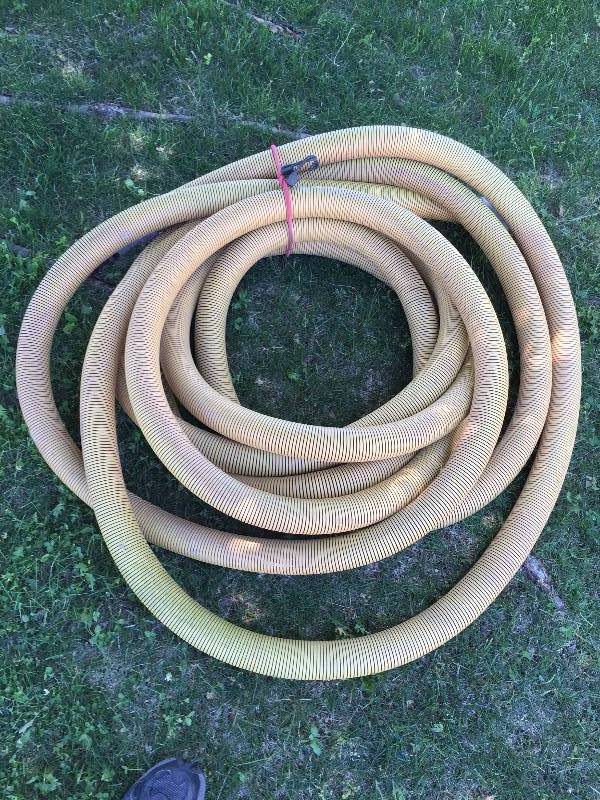 lot 33 image: 50 (Foot) 2 Thick Commercial Professional-Grade Carpet Cleaning Vacuum Hose With Cuffs - Excellent Condition