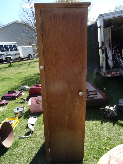 Wood Single Door Cabinet. No Back, No Shelves, Right Side Finished