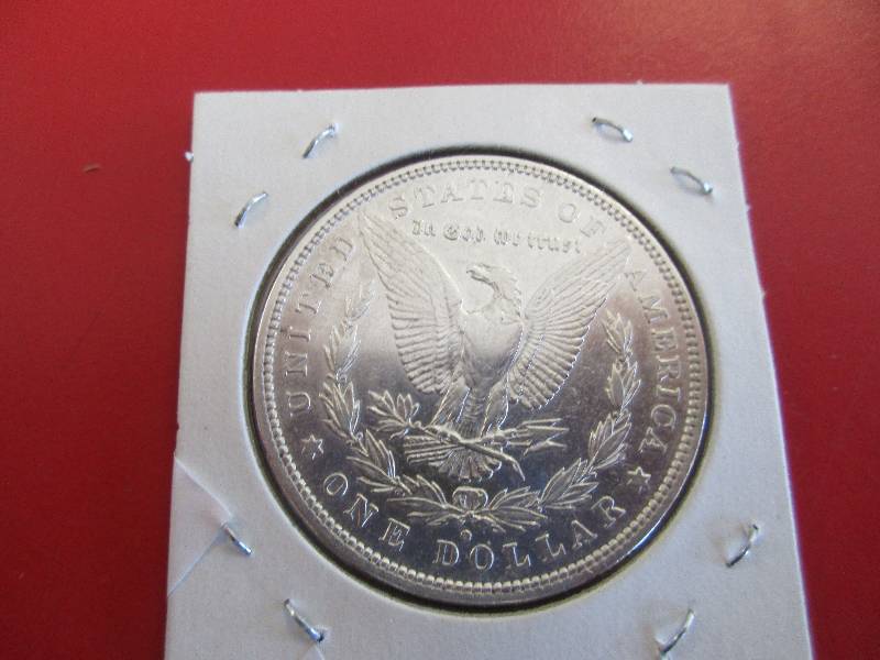Lot #9  1880-O Morgan Silver Dollar in AUBU Condition.