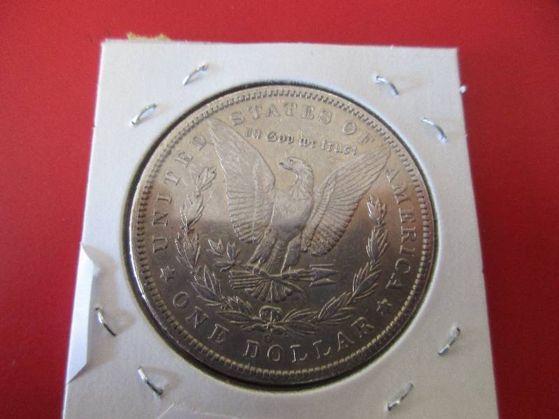 Lot #13  1900-O Morgan Silver Dollar in AUBU Condition.
