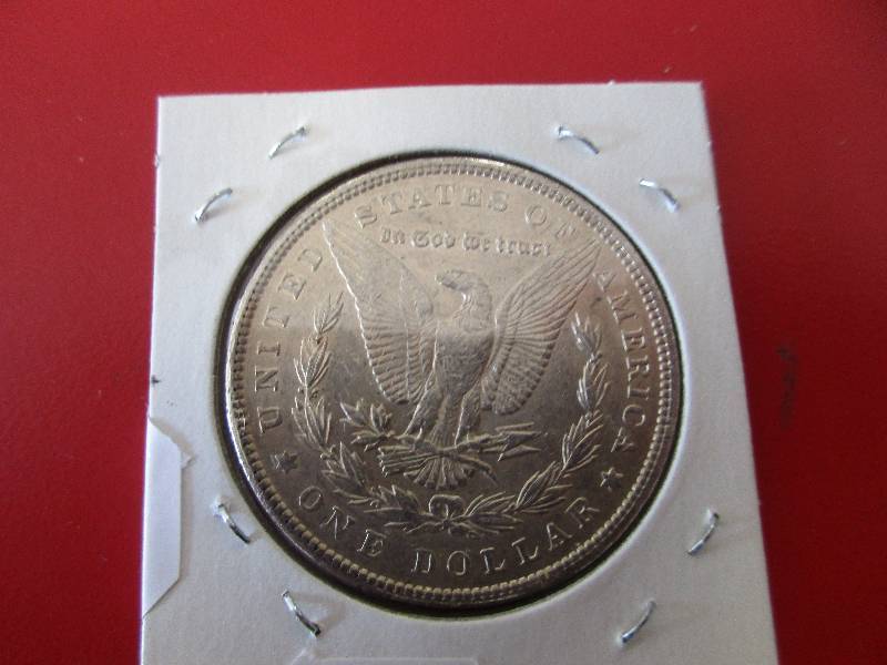 Lot #17  1900-P Morgan Silver Dollar in AUBU Condition.