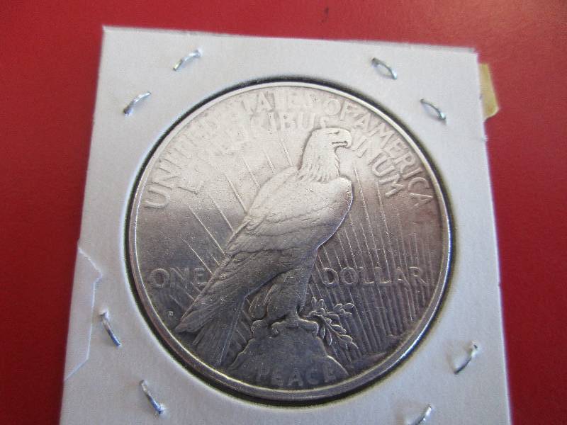 Lot #18  1922-D Silver Peace Dollar  The Peace Dollar replaced the MSD in 1921 and like the MSD has 90% silver content  Good Looking Coin