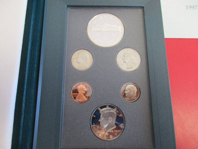 Lot #27  1997 US Mint Prestige Set with original box and certificate of authenticity. Featuring the US Botanic Garden Commemorative Silver Dollar, it is one of the key dates of the Prestige Set series.