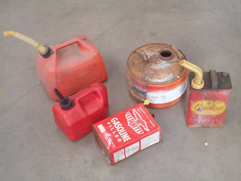 Lot Of (4) Gas Cans & (1) Steel Oil...