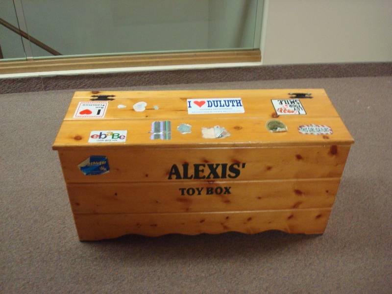 lot 9 image: Wood Toy Box, Used, Has Stickers And Decal On It