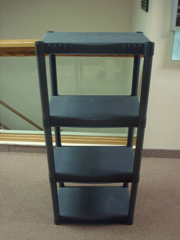 lot 15 image: Grey Plastic Shelf, Comes Apart