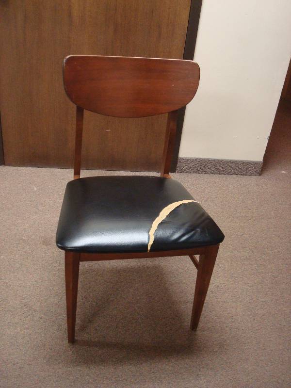 lot 22 image: Vintage Keller Mfg Company Chair, Has Tear