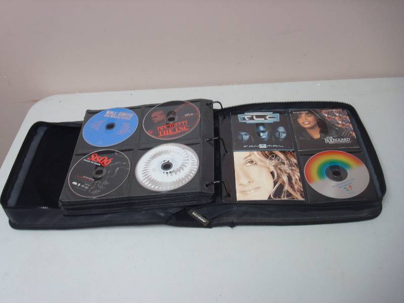 lot 59 image: Book Of CDs And Artwork, Used, May Show Wear