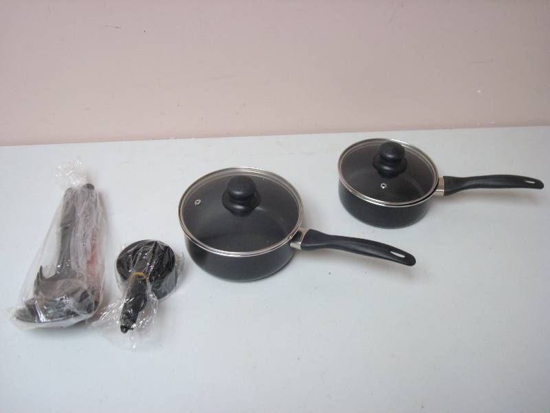 lot 64 image: Pair Of New Sauce Pans With Covers With Measuring Cups