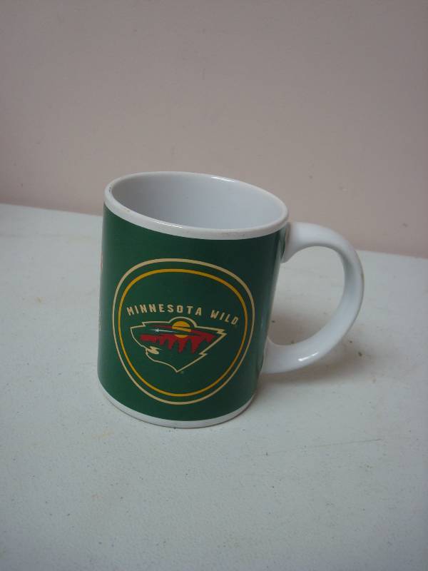 lot 75 image: Minnesota Wild Hockey Coffee Mug, Light Marks