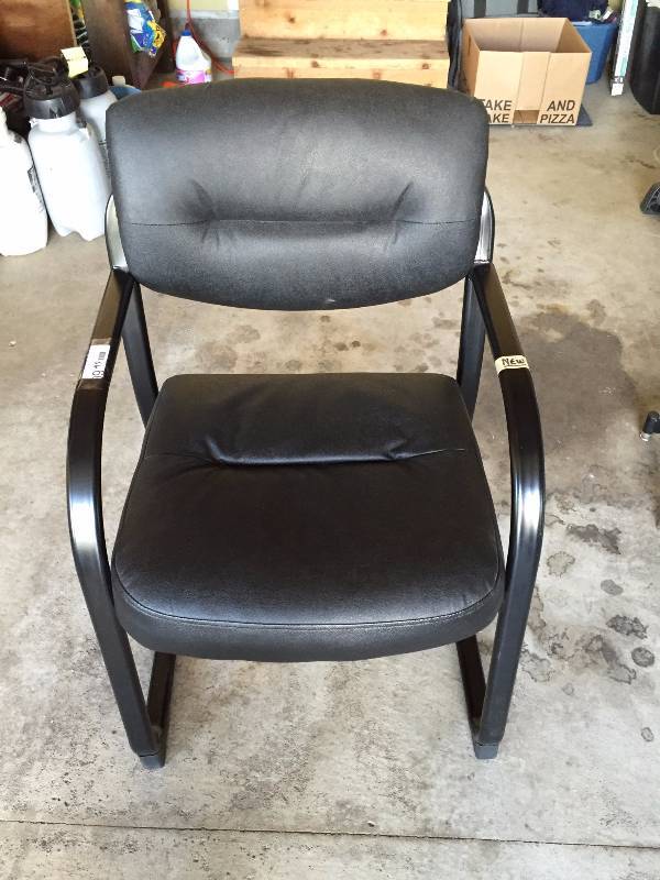 lot 66 image: New Black Leather Ultra Executive Guest and Reception Chair with Sled base - Retails $190.00 Currently On Sale At Target $130.00