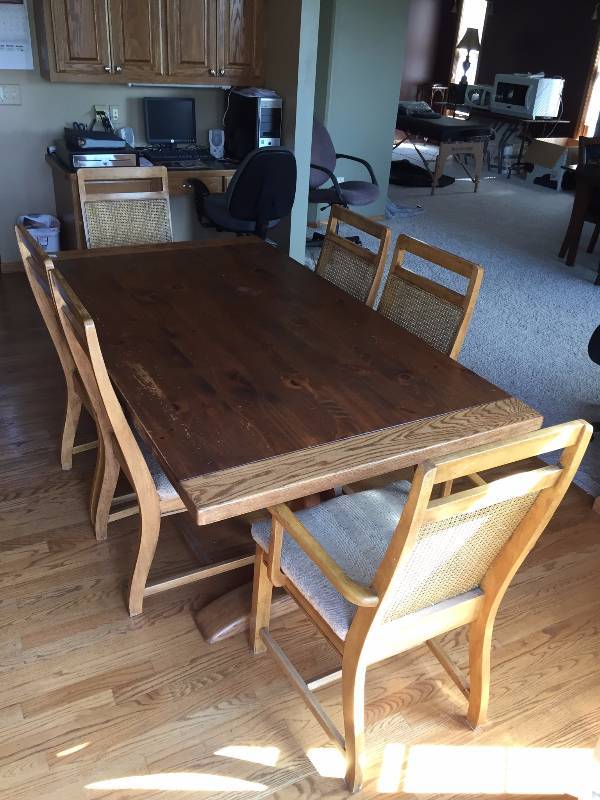 lot 68 image: Mission Style Quality Made Conant Ball Dining Table With 2 Extra Leaves Plus 6 Caned Back Cushioned Chairs - Nice Condition - Tabletop Needs Refinishing - Still Very Sturdy - See Multiple Pics