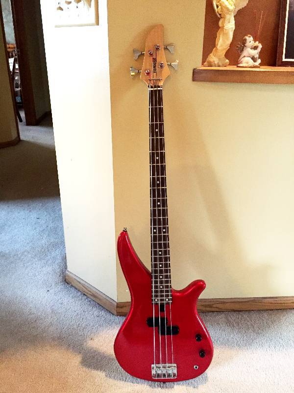 lot 117 image: YOW METALLIC RED YAMAHA ELECTRIC RIGHT HANDED 4 STRING BASS GUITAR, MODEL RBX260 WITH HARD CASE