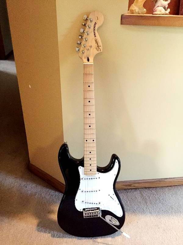 lot 127 image: Fender Squire Strat and Gigbag