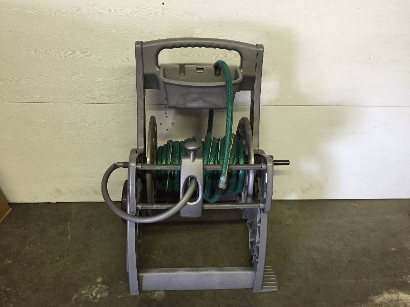 lot 15 image: HOSE CADDY WITH WHEELS