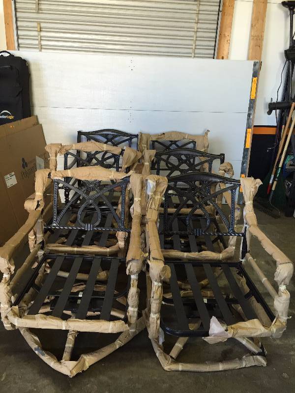 lot 53 image: GRAND TERRACE SWIVEL ROCKING LOUNGE CHAIRS (6) WITH 48 ROUND TABLE NEW