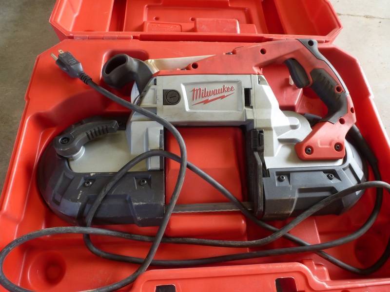 lot 202 image: Milwaukee Portable Band Saw