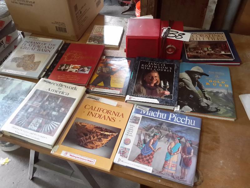 lot 38 image: Sentinel AM Radio.. Tested and Works  Large lot of Misc. Subject books as pictured