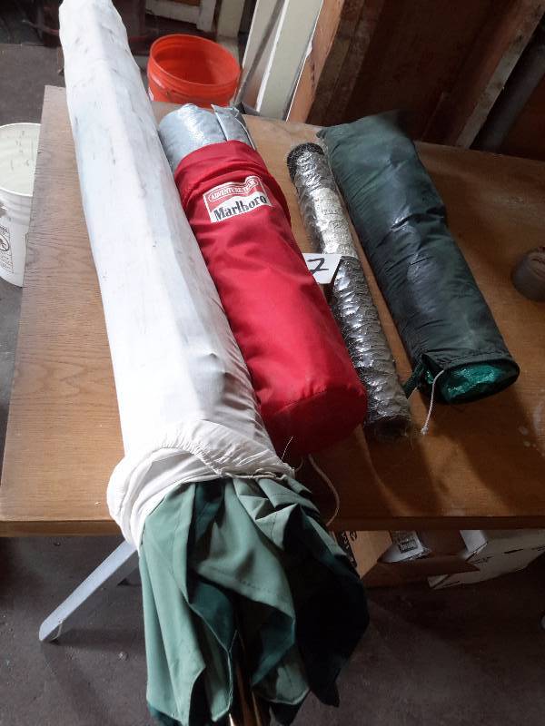 lot 67 image: Patio Umbrella (no lower postpipe) Roll of 24in chicken wire 2 tarps