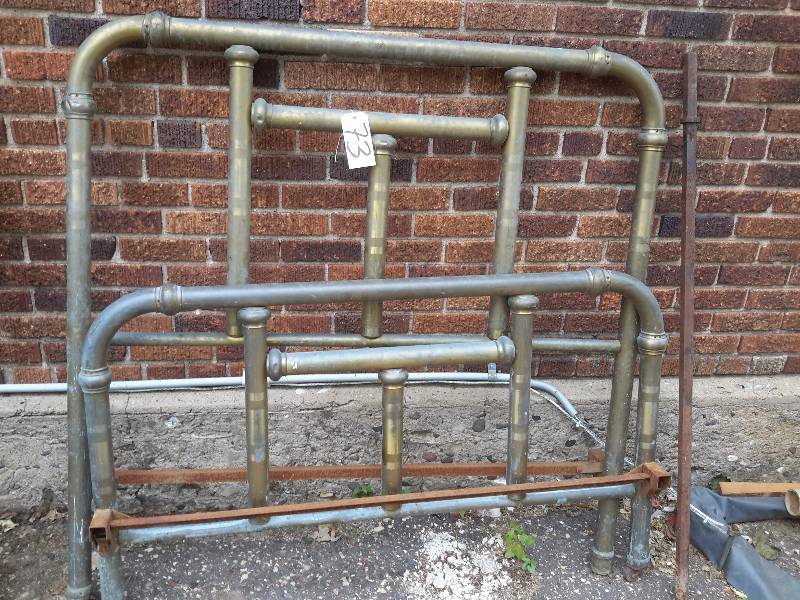 lot 73 image: Double Brass Bed HEADBOARD and FOOTBOARD.. No rails.. Needs some polish.. Only a few little dents