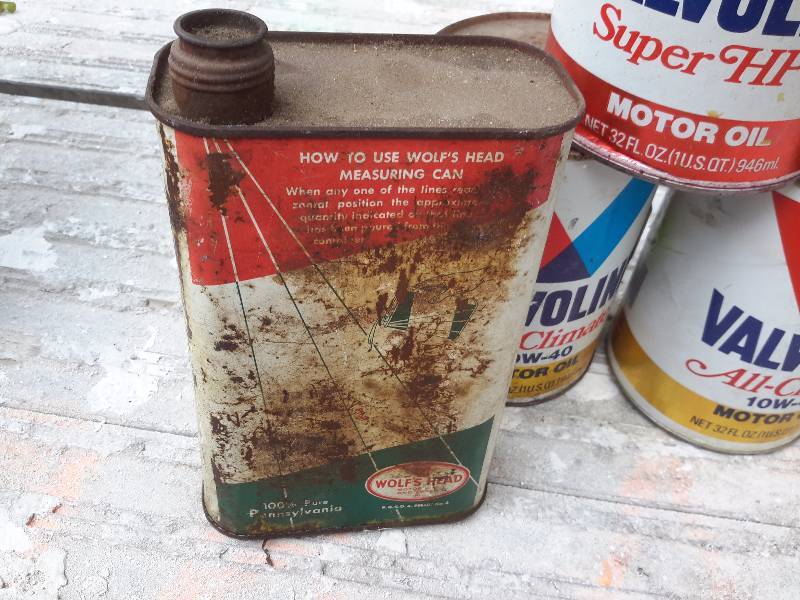 lot 80 image: 15 Cans of oil. All Full