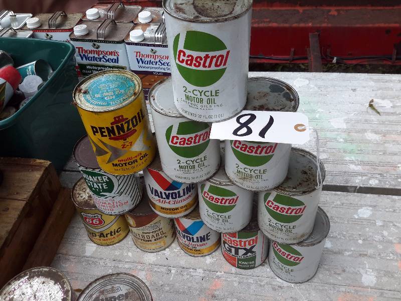 lot 81 image: 13 Cans of oil.. All Full