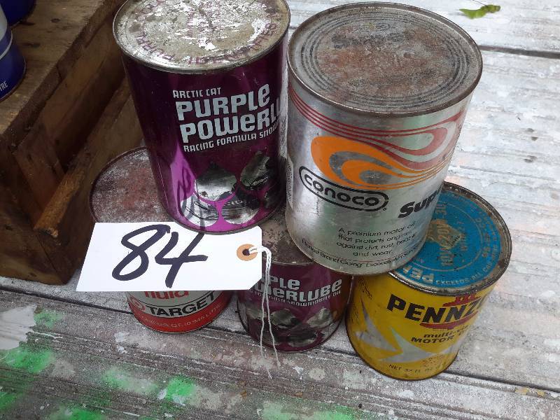lot 84 image: 5 Cans of Oil.. Full