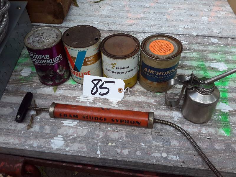 lot 85 image: 3 Cans oil, Full 1 Can empty Oil Filter Suction Pump