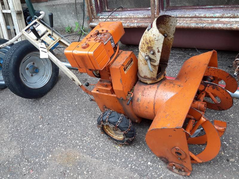lot 11 image: Wards Power Kraft 2 Stage, 7 H.P Snow Blower. .Has chains.  This runs GREAT