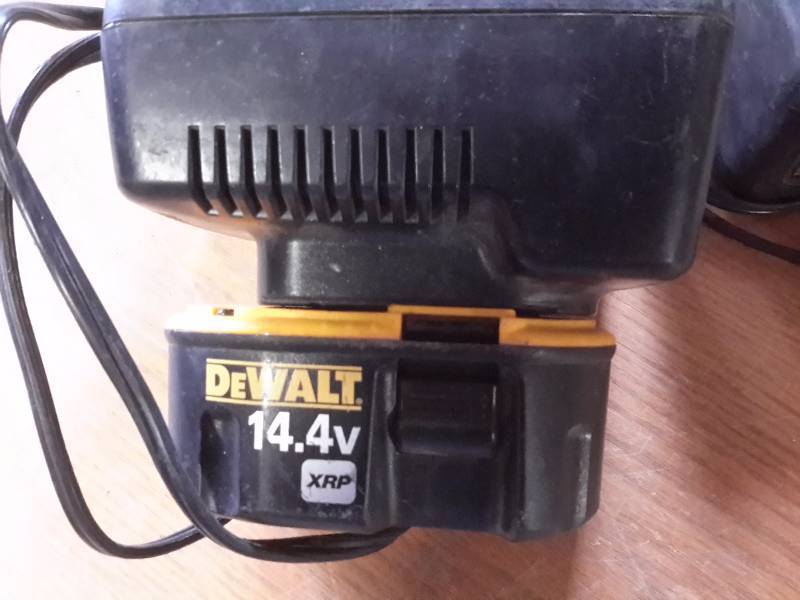 lot 57 image: 2 Dewalt chargers and a 14.4v Battery