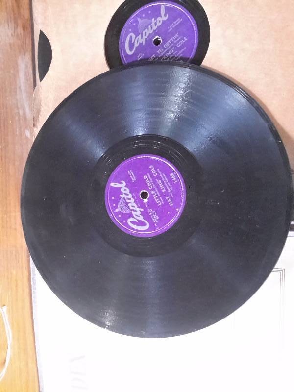 lot 71 image: Microscope,  Bible and Vintage NAT KING COLE, 78 Records.. See close-up for list of songs