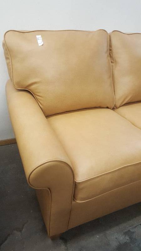Tan Leather Loveseat.. Made by Flexsteel, Westside collection
