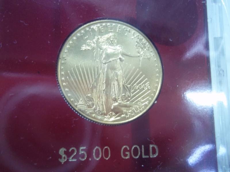 lot 3 image: $25 Gold American Eagle 12 Oz. Fine Gold Coin with Certificate of Authenticity